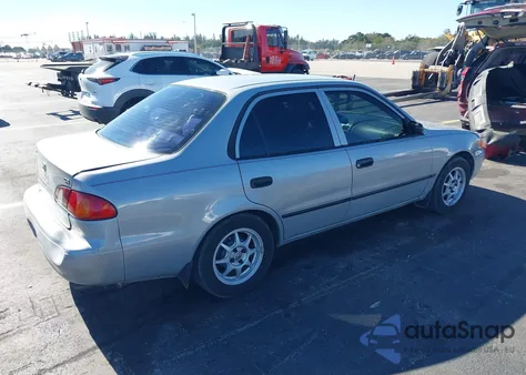 2000 Toyota Corolla Ce z USA, uszkodzony, nr VIN 2T1BR12E3YC301957